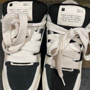 Amiri Men Sneakers Black and white in color